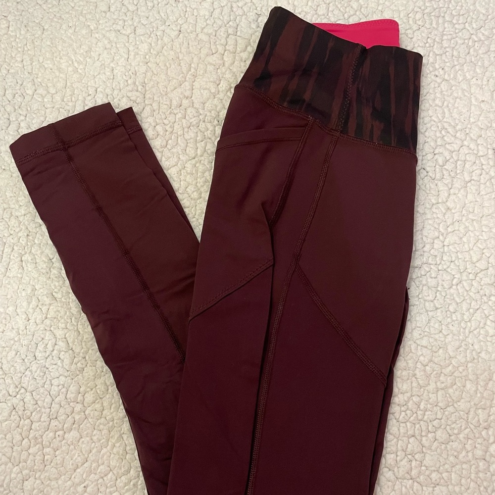 Maroon lulu lemon leggings with striped band
